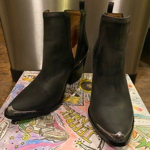 Jeffery Campbell black distressed Cromwell boots.